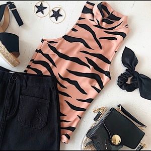 Worn once tiger print mock neck bodysuit medium!